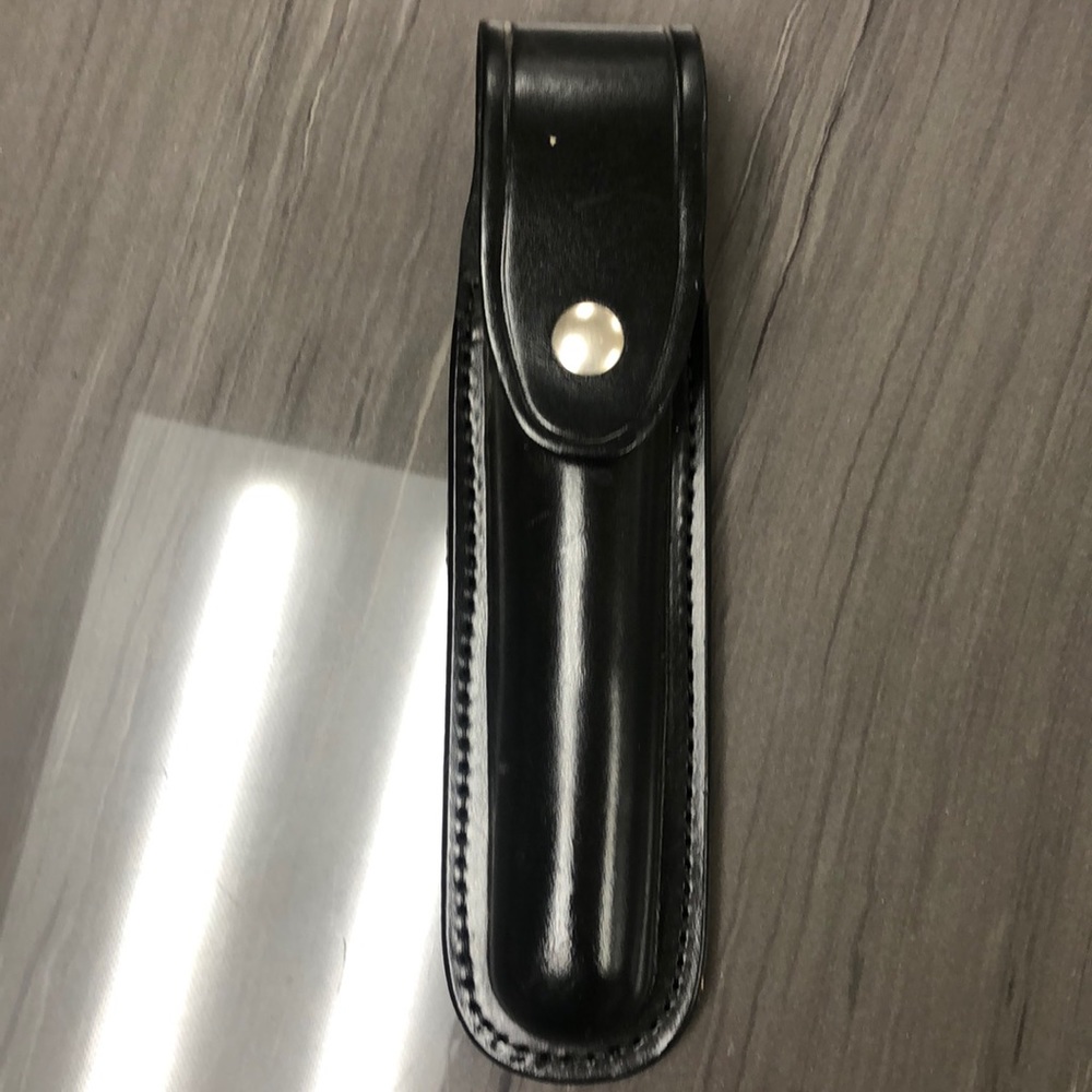 Flashlight or baton holder